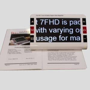 A magnifier enlarges text on an open book, highlighting small print clearly.