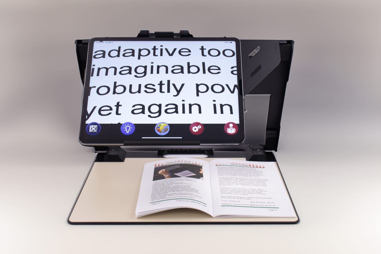 A tablet with a magnified screen projecting text above an open book.