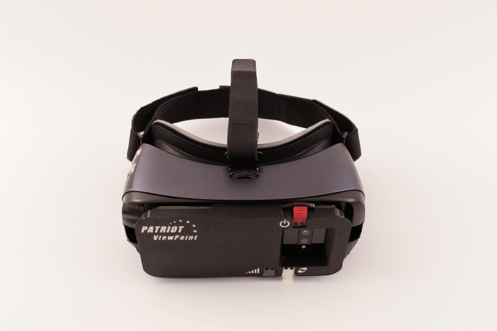 Close-up of a black VR headset on a white background.