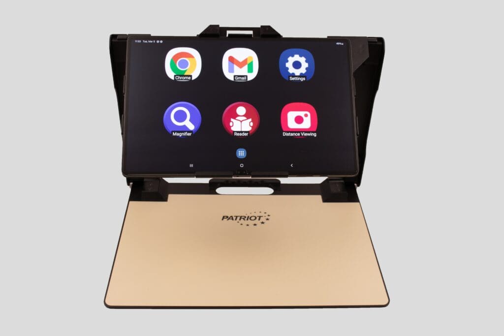 Tablet in a gold case displaying app icons on the screen.