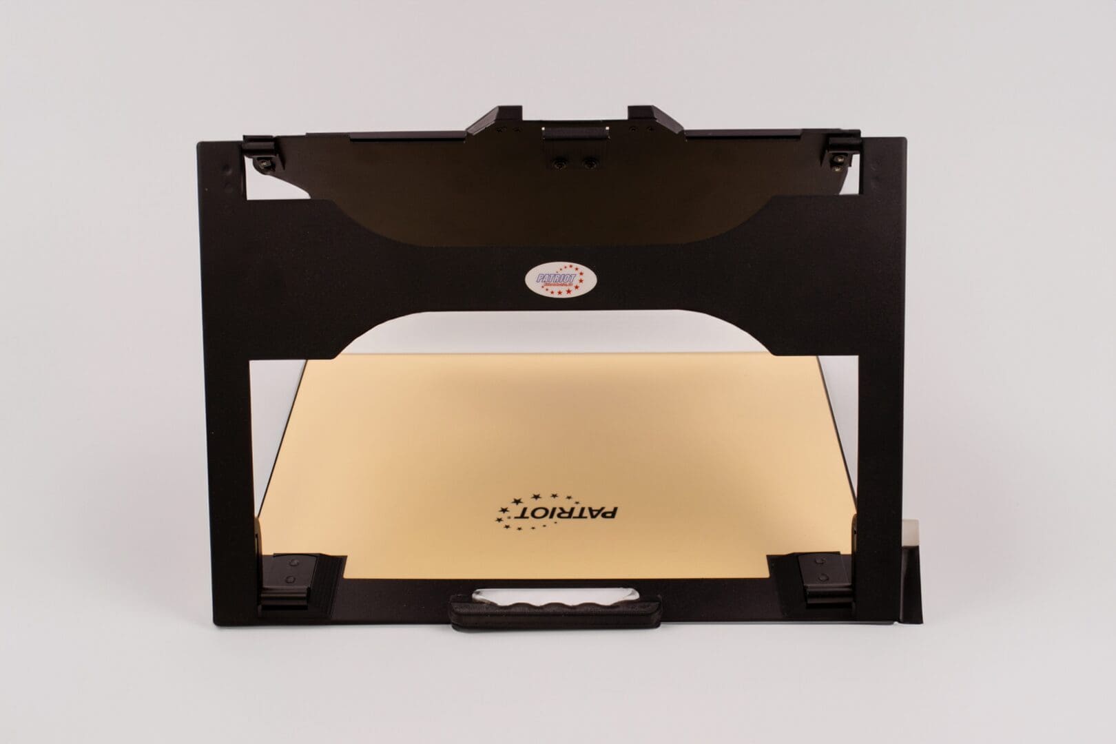 Black portable document scanner with a beige document inside.